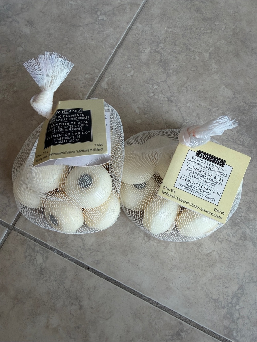 Ashland Cream Floating Votive Candles - Mesh Pack